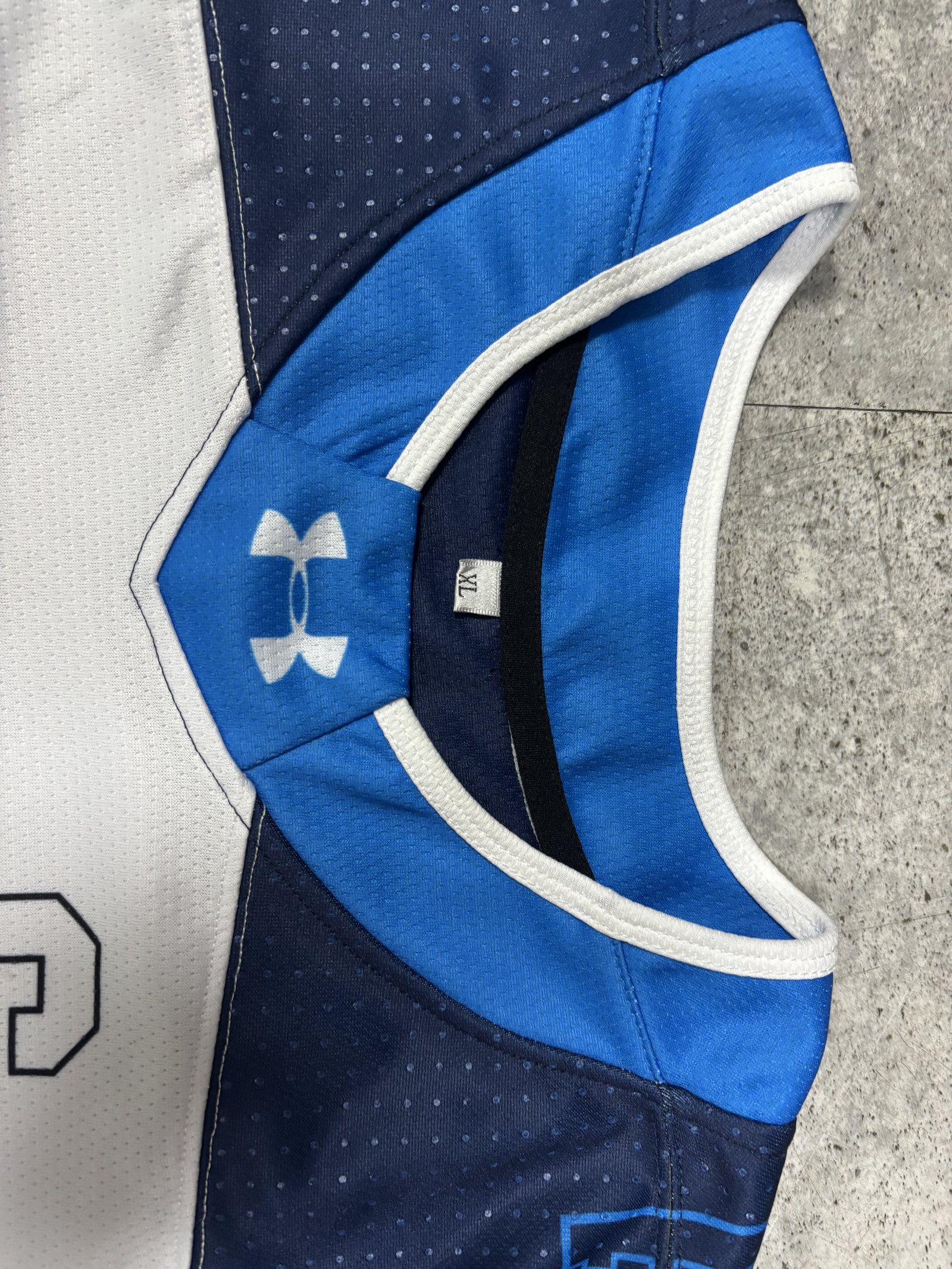 Close-up of custom team jersey collar and decoration details